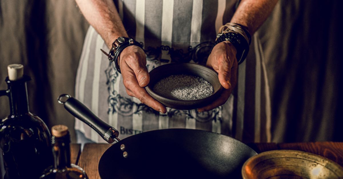 Seasoning food with salt